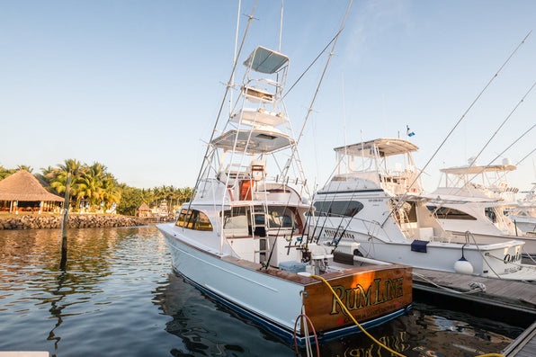 Sport-fishing boats moored in a tropical marina for bluewater and offshore fly fishing