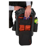 Front view of Simms G3 Guide Backpack in Anvil showing open front organizer, interior pockets, and side water bottle