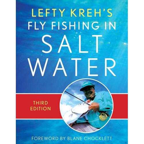 Front cover of Fly Fishing in Saltwater showing blue ocean background, an angler holding a fish, and a red Third Edition banner