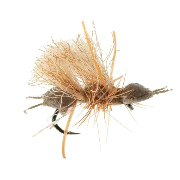 Side view of Umpqua Chubby Cubby dry fly, size 16, showcasing foam body, tan wing and rubber legs on white background