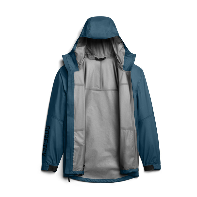 Front view of Sitka Dew Point UL jacket in Blue Spruce showing hood, open front with gray lining and GORE-TEX logo on sleeve on white background