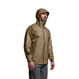 Three-quarter view of SITKA Dew Point UL Jacket on male model, hood up, tan color, GORE-TEX logo on sleeve, white background