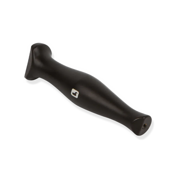 Angled view of Loon Outdoors Ergo Hair Packer showing ergonomic tapered black handle with small Loon logo on white background