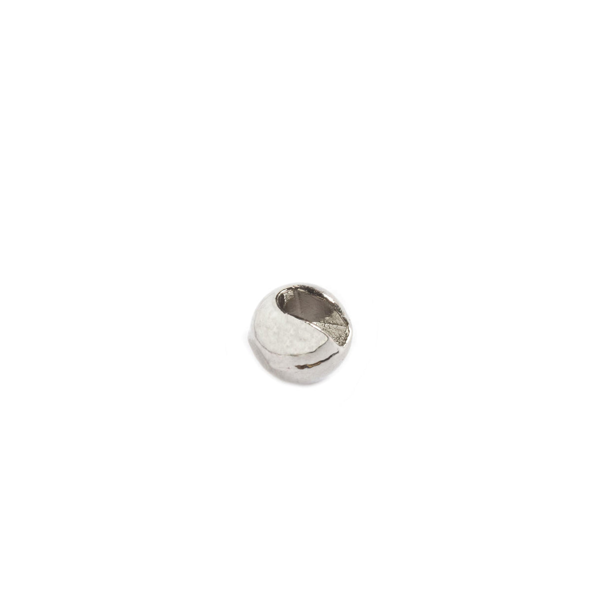 Close-up of Fulling Mill tungsten bead showcasing a slotted cut and hollow center on white background