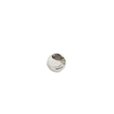 Close-up of Fulling Mill tungsten bead showcasing a slotted cut and hollow center on white background