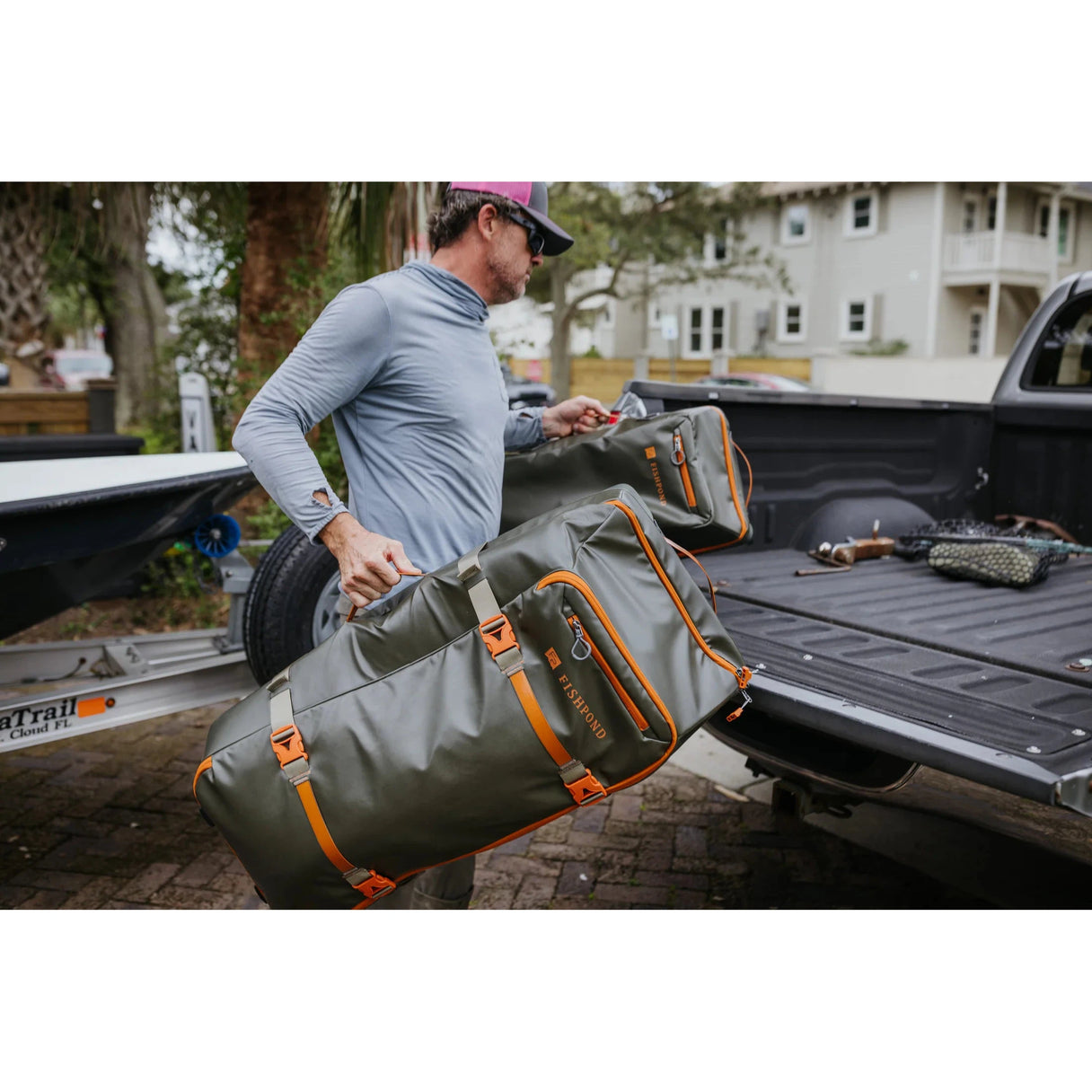 Fishpond Stormshadow Large Rolling Duffel - Yellow Dog Logo