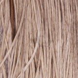 Close-up of Whiting Farms Rooster 1/2 Saddle (Bronze Grade) medium-dun hackle feathers long and dense on white