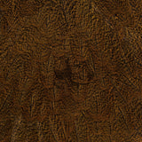 Close-up of Whiting Coq de Leon hen saddle showcasing speckled golden olive feathers with dense black ticking on a dark background