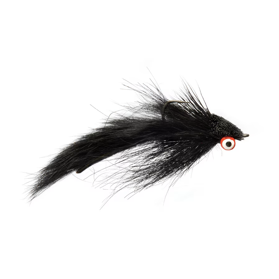 Side view of Sculpin Slider fly, size 4, showing long black rabbit zonker tail and red and white eye on white background