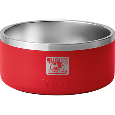 Front view of YETI Boomer 8 dog bowl with stainless-steel interior and red exterior with Yellow Dog logo on white