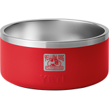 Front view of YETI Boomer 8 dog bowl with stainless-steel interior and red exterior with Yellow Dog logo on white