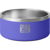 Angled front of YETI Boomer 8 dog bowl showing stainless-steel interior and Ultramarine Violet exterior with embossed YETI